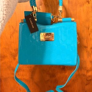 NWT Bebe Dana Monogram Top Handle Crossbody bag in Capri Blue